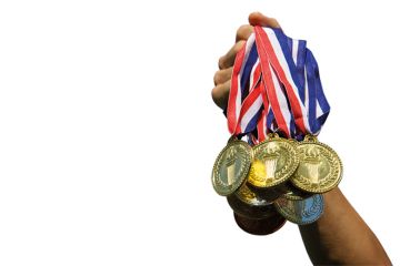 Someone holding gold medals