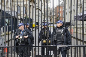 Heavy security presence in front of the Prime Minister's Office at 10 Downing Street Heavy security presence in front of the Prime Minister's Office at 10 Downing Street