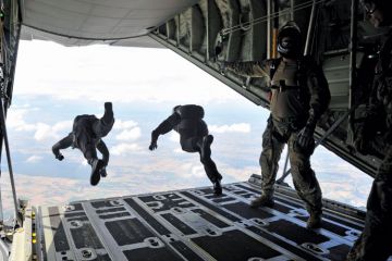 High-altitude, low-opening (HALO) paratroopers jumping from aircraft