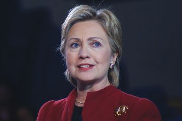 Hillary Clinton speaking on stage Hillary Clinton speaking on stage