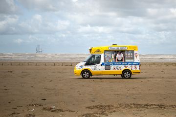 Ice cream van on empty beach with owner looking for customers. To illustrate that interest among learners and providers for the lifelong learning entitlement appears lukewarm at best.
