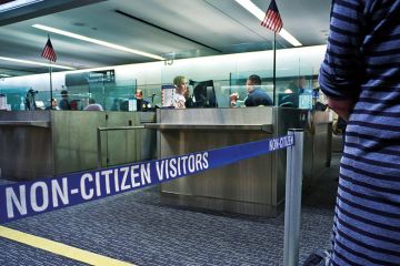 Immigration passport control queue for non US citizens