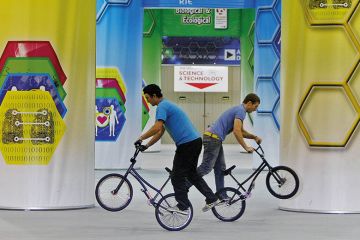 2 BMX riders at a science and technology exhibition in Dublin. To illustrate the merger of 2 funding agencies to form Research Ireland. 2 BMX riders at a science and technology exhibition in Dublin. To illustrate the merger of 2 funding agencies to form Research Ireland.