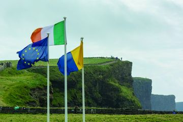 Irish, European Union and Clare flags flying Irish, European Union and Clare flags flying