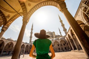 Woman at the Blue Mosque in Istanbul
