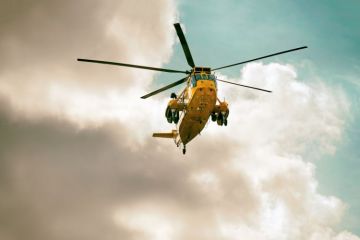 Search and Rescue helicopter in Northumberland, North East England, UK