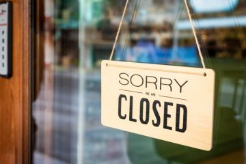 Sign saying: ‘Sorry, we are closed’ Sign saying: ‘Sorry, we are closed’