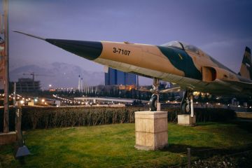 Iranian jet is a part of an open-air exibition in the Museum of Islamic Revolution and Holy Defence in Northern Tehran