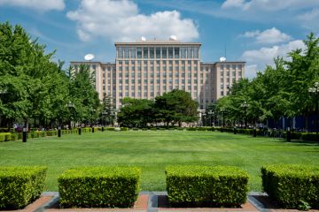 Green gardens and the main Building of the famous Tsinghua University in Beijing, China. Green gardens and the main Building of the famous Tsinghua University in Beijing, China.