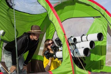 Camera arrays with special filters aim at the sun to capture the total solar eclipse.