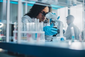 Biotechnology specialist working with advanced equipment