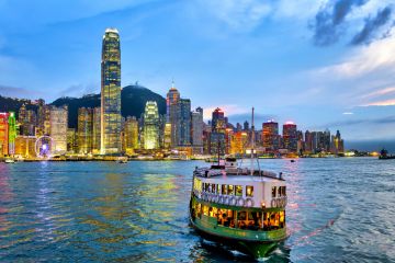A star ferry in the Victoria Harbour at sunset, Hong Kong, China. A star ferry in the Victoria Harbour at sunset, Hong Kong, China.