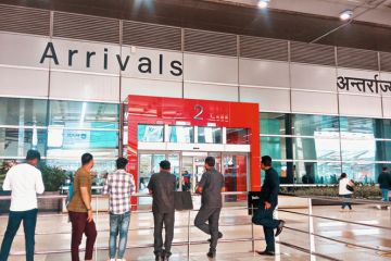 People waiting at arrival at Delhi IGI IndiaAirport, India