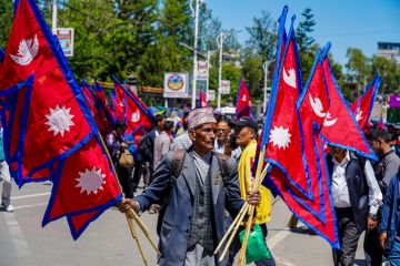 Pro-monarchy demonstrators waving national flags during a rally in Kathmandu, Nepal, in May 2025 Pro-monarchy demonstrators waving national flags during a rally in Kathmandu, Nepal, in May 2025