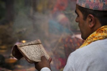 Nepalese Brahman reading Hindu religious mantras Nepalese Brahman reading Hindu religious mantras.
