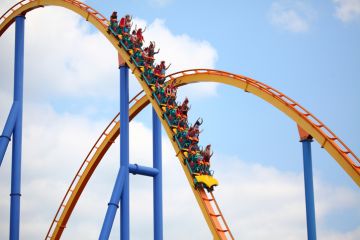 People riding the Behemoth rollercoaster at Canada's Wonderland amusement park People riding the Behemoth rollercoaster at Canada's Wonderland amusement park