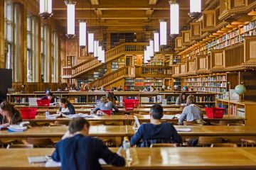 Wooden-panelled interior of a library Wooden-panelled interior of a library