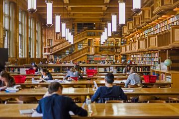  Students who studying inside the library of the university of Leuven, Belgium, old from the years 1425.