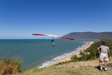 Hang glider starting from from Trinity Bay lookout.