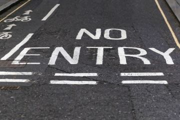 ‘No entry’ painted on a road access, widening participation, no entry