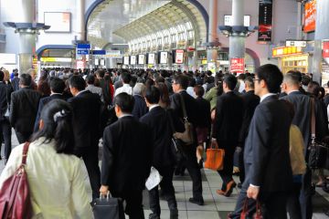 Commuters on the metro in Tokyo, Japan Commuters on the metro in Tokyo, Japan