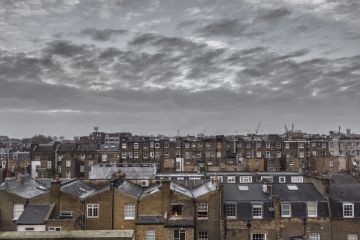 Classic rooftops in London with grey sky and clouds Classic rooftops in London with grey sky and clouds