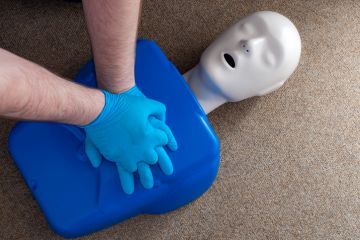 Doctors perform CPR on a manikin