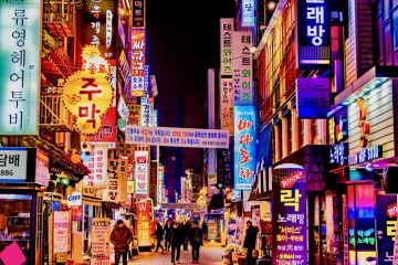 Road with bright neon signs in Seoul
