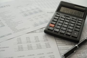 Calculator on financial statement and balance sheet