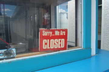 Closed sign in a shop window Closed sign in a shop window