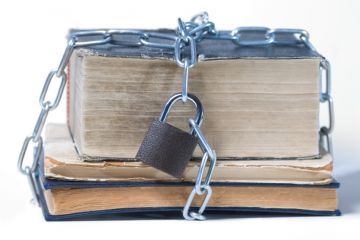'Copyright' padlock around book 'Copyright' padlock around book
