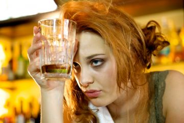 Woman in a bar