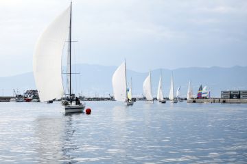 Sailboats entering the finish of the Fiumanka regatta in Rijeka, Croatia. Sailboats entering the finish of the Fiumanka regatta in Rijeka, Croatia.