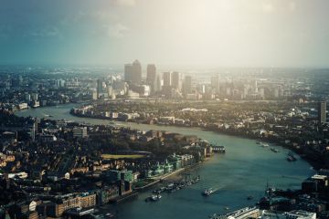 Thames River and Canary Wharf in London Thames River and Canary Wharf in London