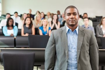 Black academic in lecture theatre