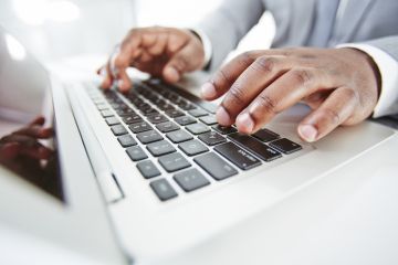 A early career black academic says he is shortlisted for job interviews more often when using a 'whitened name' Black academic writing an application