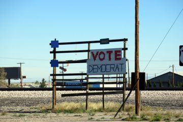 Sign supporting the Democratic Party on a shabby rack beside the road Sign supporting the Democratic Party on a shabby rack beside the road