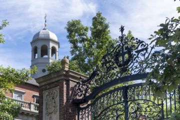 Main entrance to the Harvard Yard of Harvard University Johnston Gate in Georgian Revival design which is the main entrance to the Harvard Yard of Harvard University