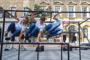 three people jumping