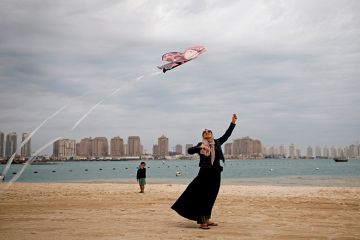 flying kite on beach Flying kite on beach