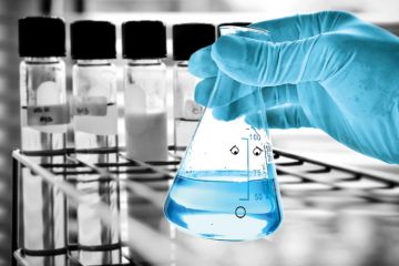 Laboratory beaker with face and suprised expression Laboratory beaker with face and suprised expression