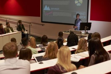 Students in a lecture about market research Students in a lecture about market research, symbolising employability