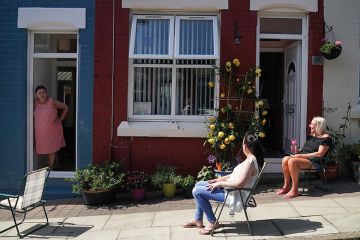 Women outside a house
