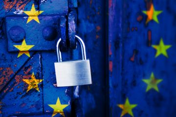 A padlocked door with the EU flag on it A padlocked door with the EU flag on it