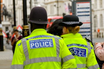 London, England, UK - 27 June 2023 Two police officers of the Metropolitan Police on patrol in central London. London, England, UK - 27 June 2023 Two police officers of the Metropolitan Police on patrol in central London.