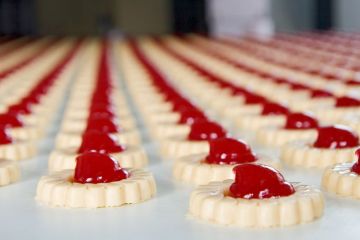 Long rows of jam-filled biscuits Long rows of jam-filled biscuits