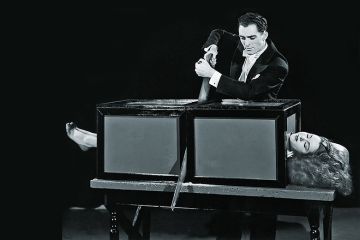 Magician saws woman in half