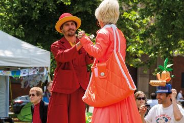 Man and woman dancing wearing stilts Man and woman dancing wearing stilts