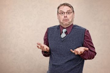  Man Shrugging his Shoulders