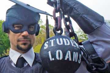 Masked man shackled by 'Student Loans' ball and chain Masked man shackled by 'Student Loans' ball and chain